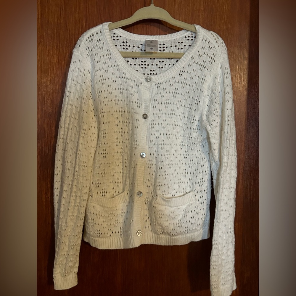 Girl’s cream cardigan sweater
